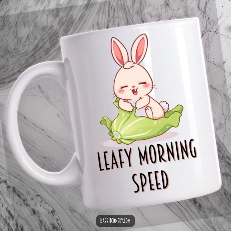 Funny mug showing a rabbit comically sliding at speed on a large, freshly picked lettuce leaf, a moment of slippery delight.