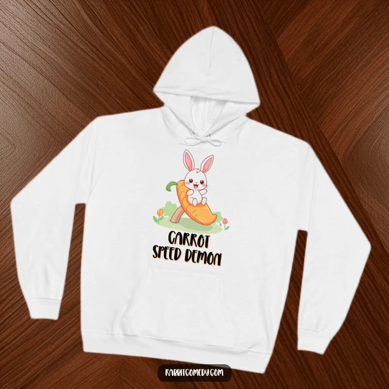 Funny hoodie featuring a giddy rabbit sliding down a whimsical carrot slide, perfect for cozying up with a laugh.