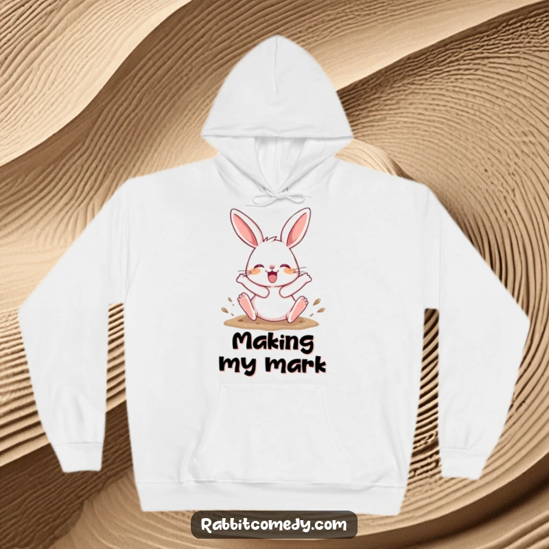 Funny Hoodie featuring a rabbit character joyfully digging with its hind legs kicking up, perfect for cozy, energetic wear.