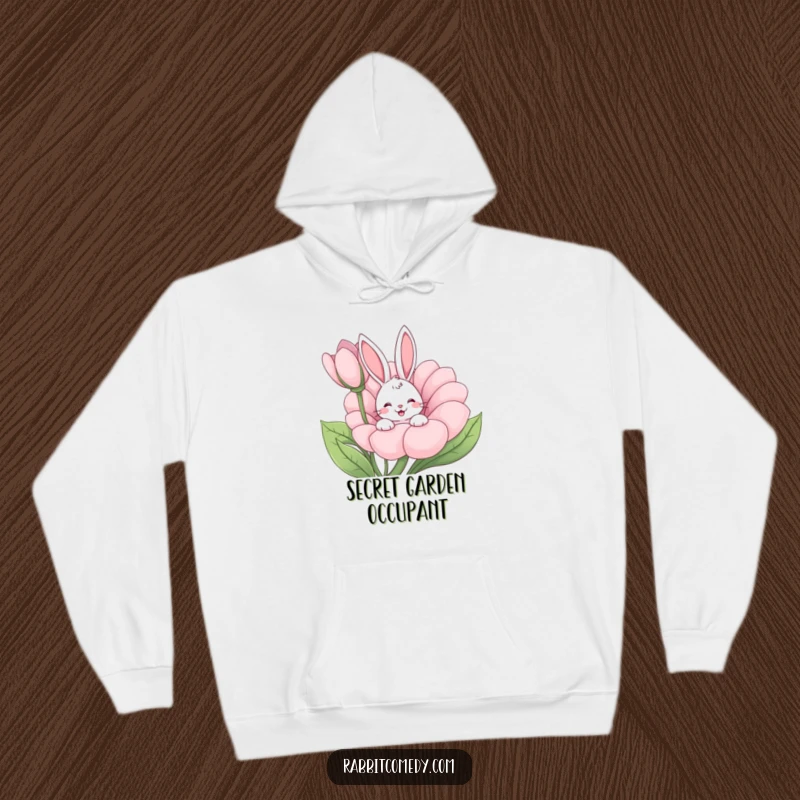 Funny rabbit peeking from a giant flower, happy wiggle, cozy cartoon hoodie, ideal humorous gift for chilly days.