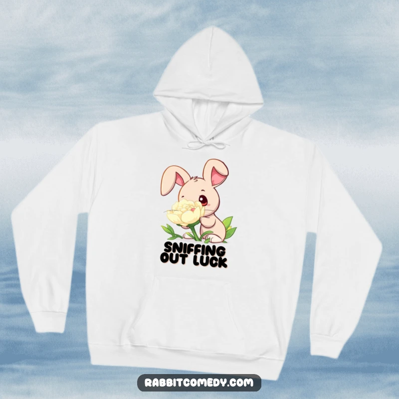 Funny hoodie print of a rabbit with wide, wondering eyes curiously sniffing a huge, dew-kissed clover, exuding peaceful curiosity.