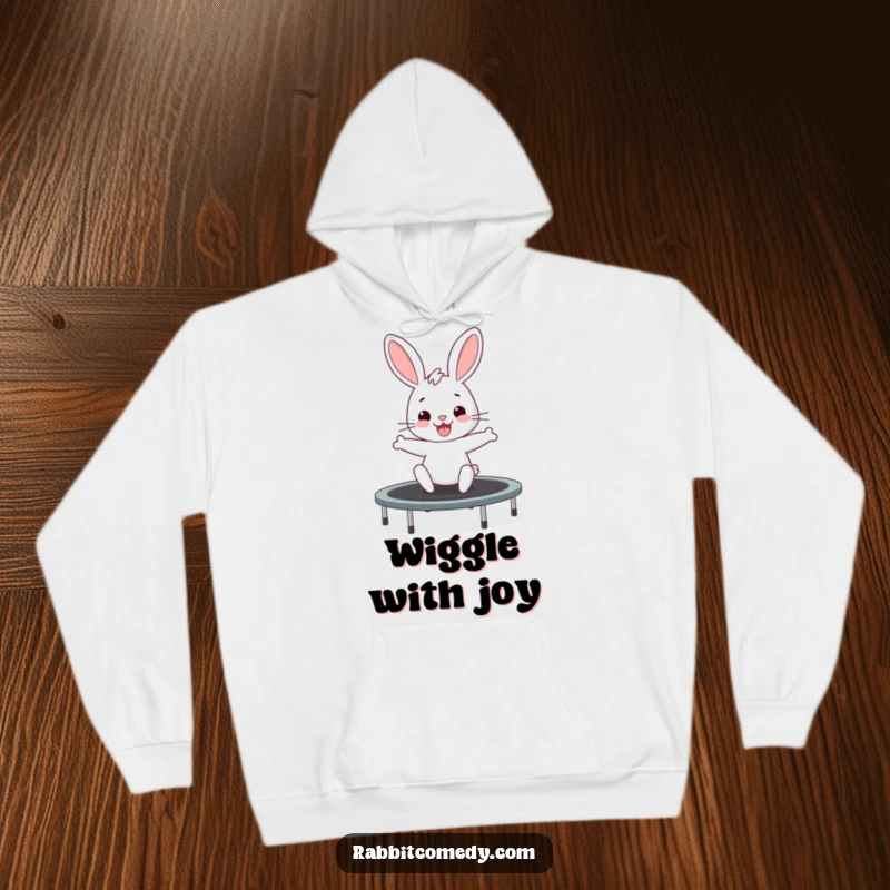 Funny rabbit hoodie featuring a cute bunny excitedly bouncing on a trampoline, perfect for casual wear and fun.