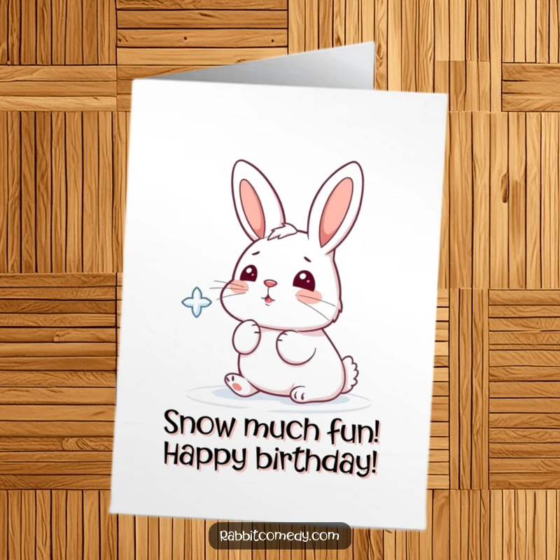 Funny Free Printable Birthday Card: A rabbit playfully catching a falling snowflake with its nose in winter.