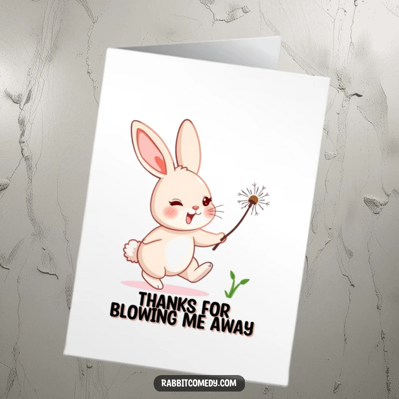 Funny free printable thank you card depicting a rabbit comically chasing a single floating dandelion seed, full of whimsical charm.