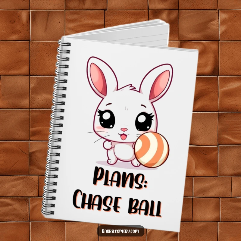 Funny rabbit notebook cover with an excited rabbit with wide eyes, ready to chase a bouncing, striped ball, inspiring humorous ideas.
