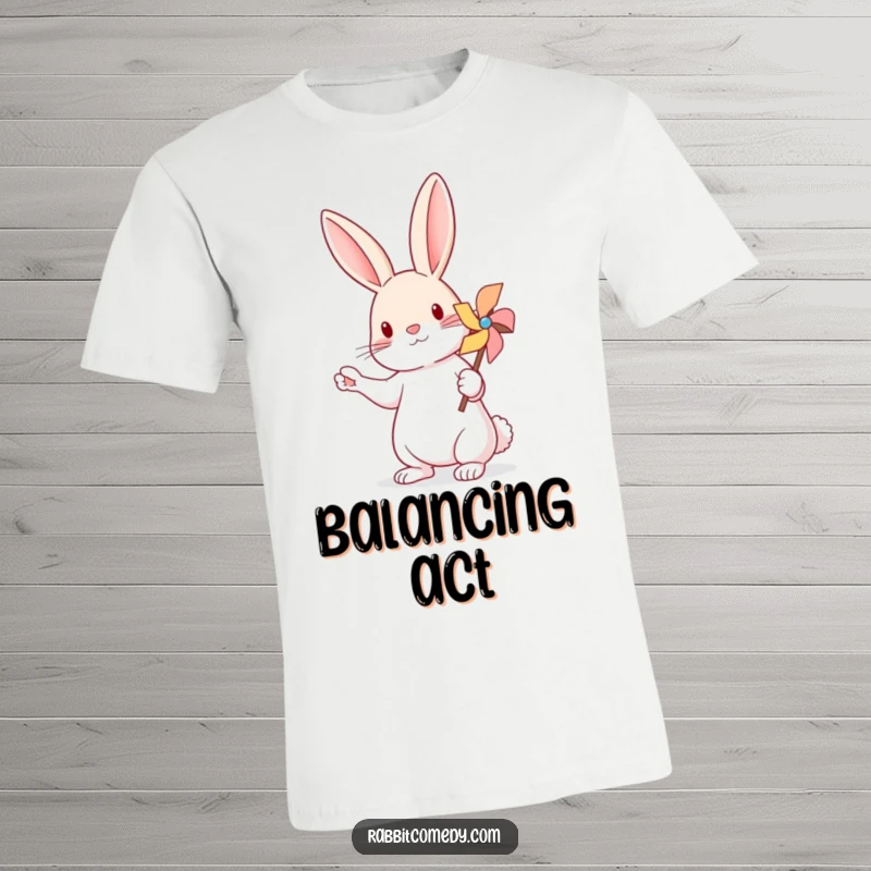 Funny Rabbit Pinwheel Balance T-Shirt: A whimsical rabbit stands on one paw, gently balancing a tiny, spinning pinwheel.