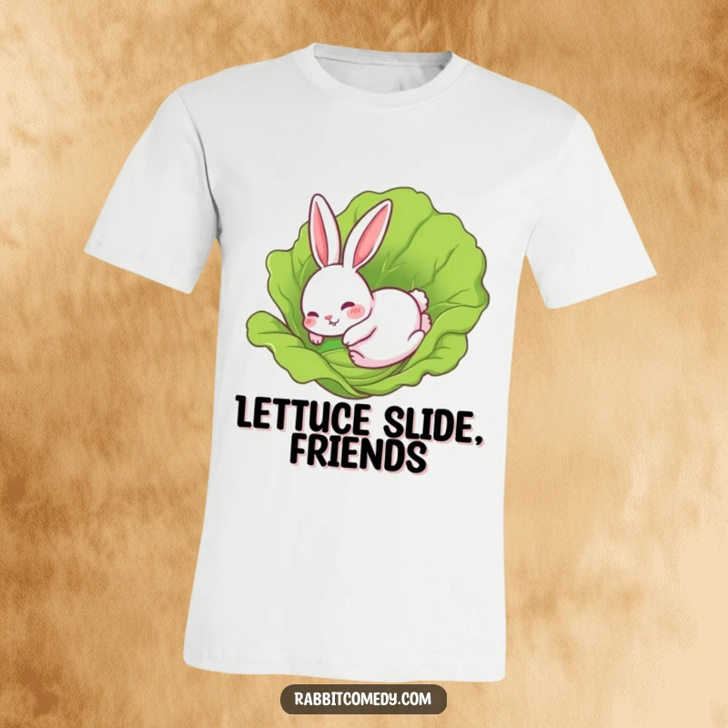 Funny Rabbit T-Shirt: A rabbit comically sliding headfirst on a large lettuce leaf, capturing a moment of hilarious misfortune.